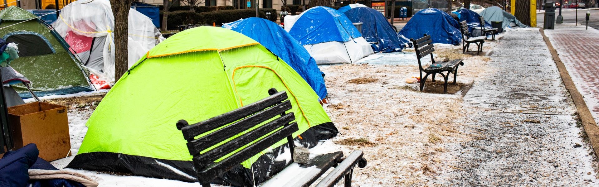 Tents on snowy street